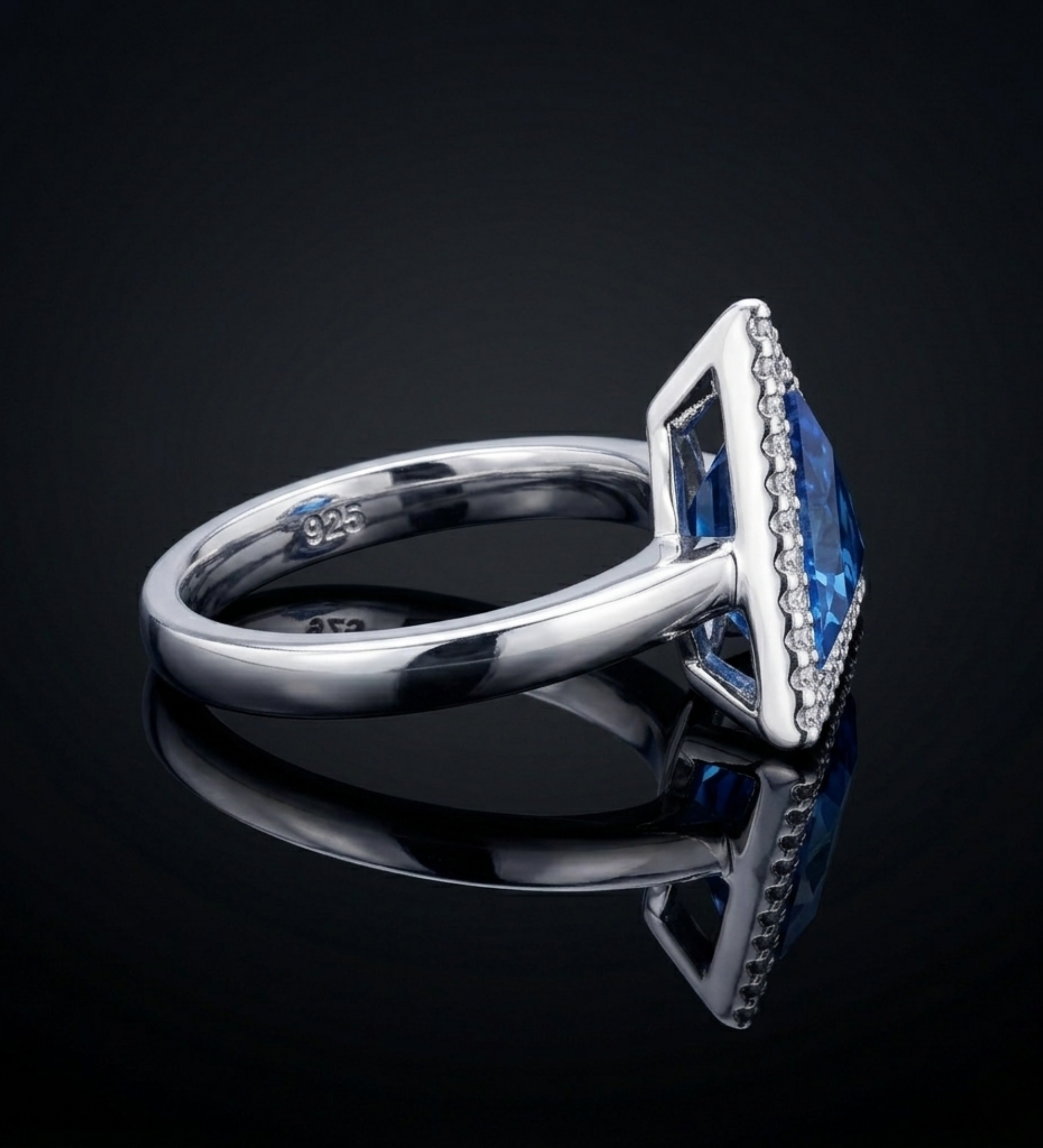Sterling Silver Tringle Shape with  Blue crystal Ring
